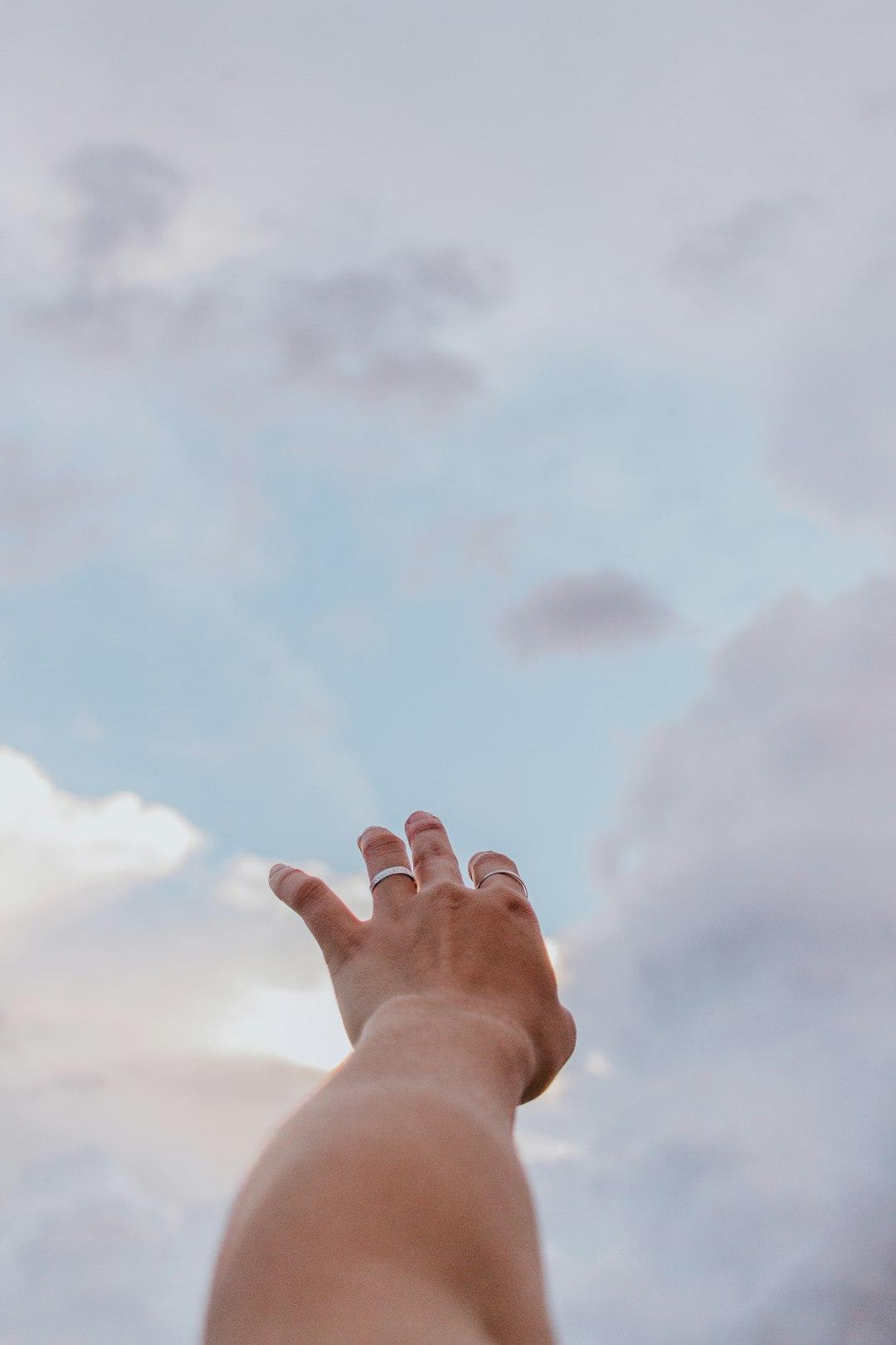 Photo by Zulmaury Saavedra persons left hand raising up